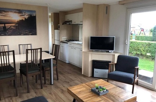 Hollum Ski Chalet | Beautiful chalet between golf course and beach