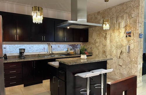 El Cortecito Apartment | Beautiful condo with pool view and private patio. Premier location near beach