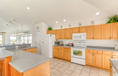 Currituck County House | Beautiful Corolla home with a pool and a hot tub just a short walk to the beach!