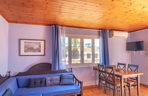Cala'n Bosch Apartment | Beautiful Apartment with Wi-Fi, Terrace and Pool Area
