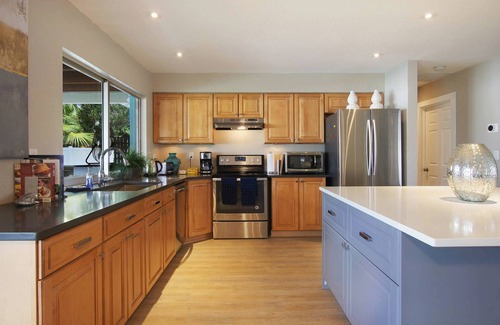 Caloosahatchee House | Beautiful fully renovated home with stunning heated pool, walk to downtown
