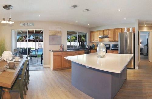 Caloosahatchee House | Beautiful fully renovated home with stunning heated pool, walk to downtown