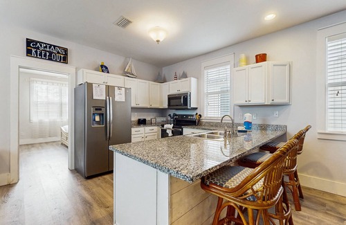 Port St. Joe House | Beautiful home in a gated community w/porches & shared pool/hot tub