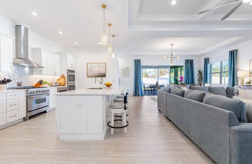 Palm Coast House | Beautiful house with heated pool, full kitchen, central AC, and washer/dryer