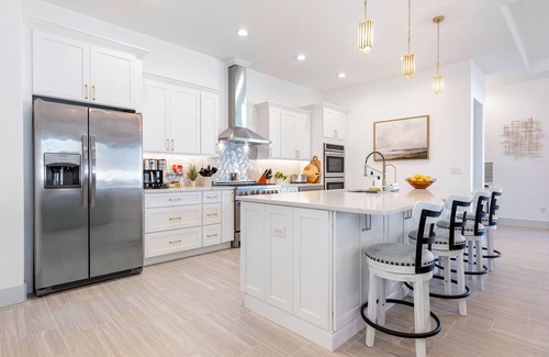 Palm Coast House | Beautiful house with heated pool, full kitchen, central AC, and washer/dryer