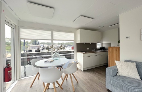 Kerkdriel Boat Rental | Beautiful houseboat in Kerkdriel harbour
