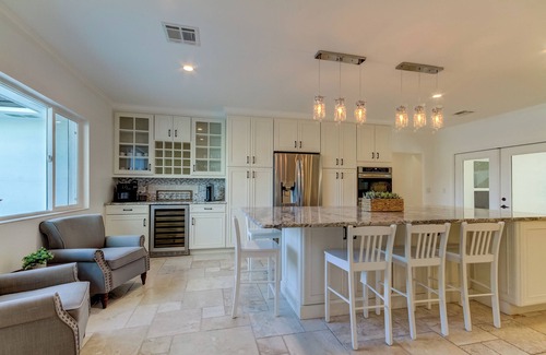 Dunedin House | Beautiful Large 5 Bedroom home! FREE Golf Cart! Close to Downtown! Video Games!