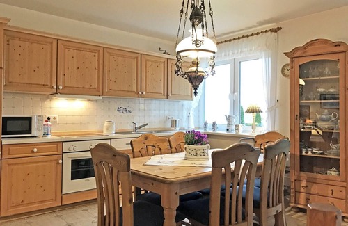 Ellenberg Apartment | Beautiful large vacation apartment "Seeschwalbe" with a fantastic view of the Schlei and a well-kept garden with many cozy spots is waiting for you to let your soul dangle