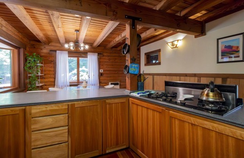 Albion House | Beautiful Log Cabin on 5 Acres with Gardens, Hot Tub, & Sauna