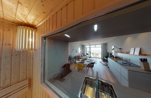 Pelzerhaken Apartment | Beautiful newly built vacation apartment with its own sauna, sea view and e-charging station