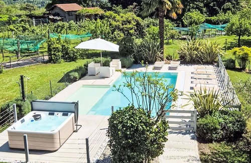 Besozzo Villa | Beautiful private villa for 8 guests with WIFI, hot tub, A/C, private pool, TV and patio