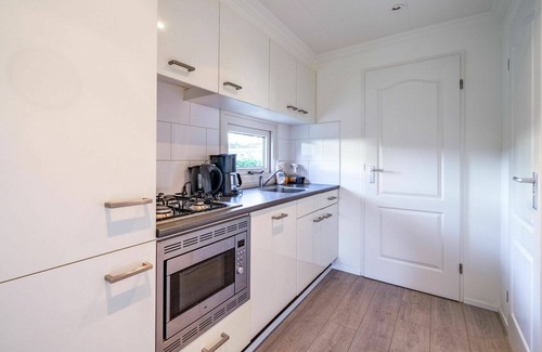 Biddinghuizen House | Beautiful private villa for 6 guests with WIFI, pool, TV, terrace and parking