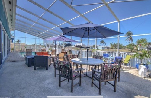 Saint James City Condo | Beautiful SJC Island Condo w/heated pool on main canal, great fishing!