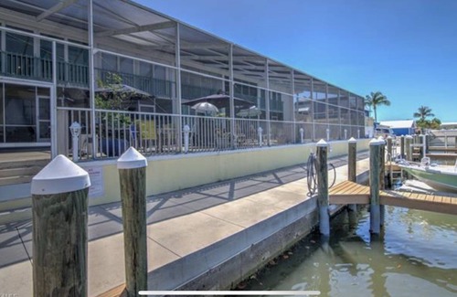Saint James City Condo | Beautiful SJC Island Condo w/heated pool on main canal, great fishing!