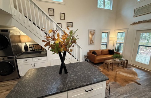 Monteagle House | Beautiful Tiny Home with Large Porch, Outdoor Fireplace & TV, and Hot Tub