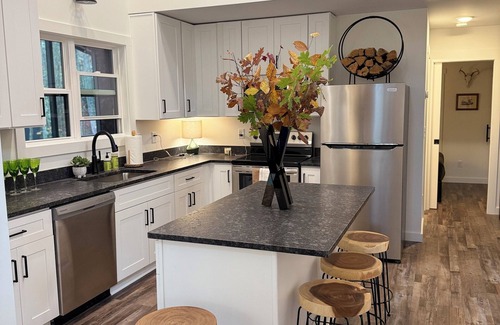 Monteagle House | Beautiful Tiny Home with Large Porch, Outdoor Fireplace & TV, and Hot Tub