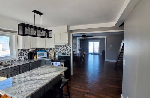 Pointe aux Roches House | Beautiful waterfront oasis this home is perfect for your next family vacation!