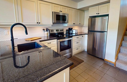 The Blue Mountains Condo | Beautifully renovated, ski-In/out condo with fireplace, WiFi, AC, & W/D