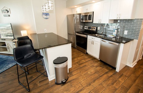 Myrtle Beach Condo | Beautifully Remodeled 12th floor Oceanview Condo steps to the ocean! Wifi!