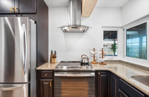 Venetian Way House | Beautifully renovated pool home - walking distance to the beach