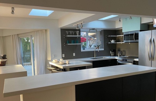 Delta House | Beautifully renovated upper level home.