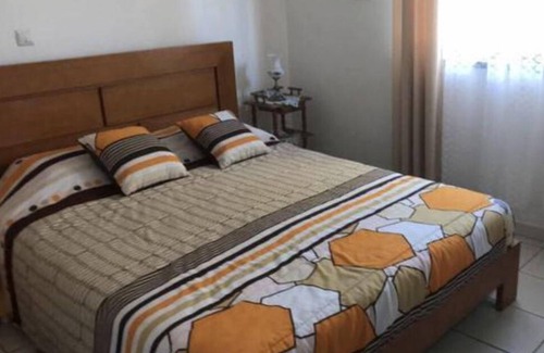 Fonte do Bispo Bed & Breakfast | Bed and breakfast amid orange trees, 10 minutes from the beach