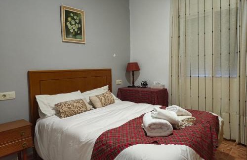 Lliria House | Bedroom with private bathroom One Bedroom Family Suite in forest with good view 80m2 large swimming pool in music city Lliria The garden and swimmingpool and garden are shared
