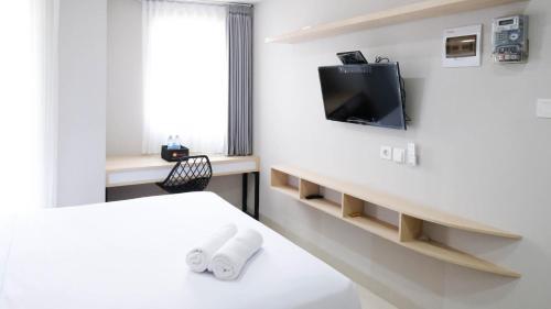 Surabaya Apartment | Best Choice and Nice Studio Apartment at Grand Dharmahusada Lagoon By Travelio