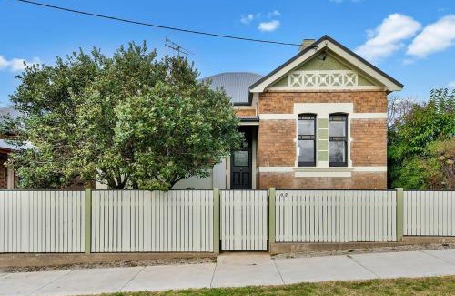 Orange House | Best Nest on March Cosy Home in CBD Firepit
