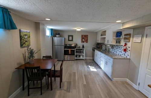 Englewood Apartment | Best Yard in Denver - Hot Tub & Outdoor Kitchen!
