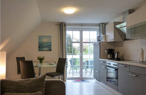 Monchgut-Granitz Apartment | "Between the Baltic Sea beach and the Bodden, the Boddenhus apartment house awaits you with its brig