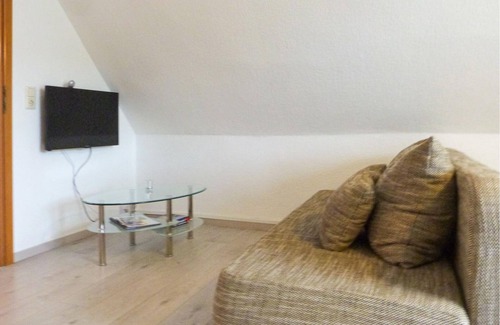Monchgut-Granitz Apartment | "Between the Baltic Sea beach and the Bodden, the Boddenhus apartment house awaits you with its brig