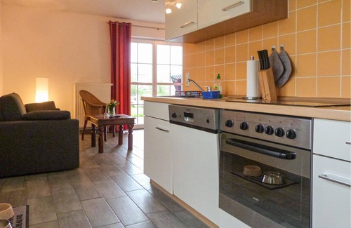 Monchgut-Granitz Apartment | "Between the Baltic Sea beach and the Bodden, the Boddenhus apartment house awaits you with its brig