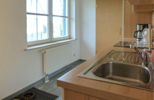 Monchgut-Granitz Apartment | Between the Baltic Sea beach and the Bodden, the Boddenhus apartment house awaits you with its brigh
