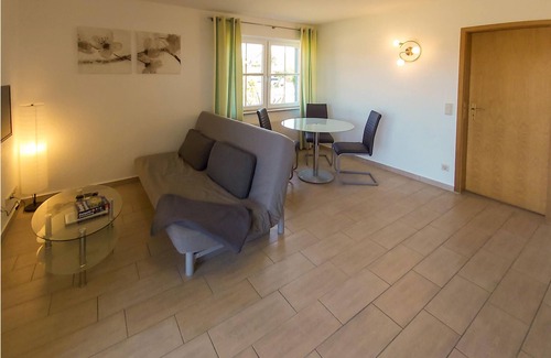 Monchgut-Granitz Apartment | "Between the Baltic Sea beach and the Bodden, the Boddenhus apartment house awaits you with its brig