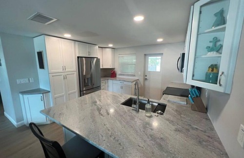 Naples Park Cottage | Blue Water Retreat @ Vanderbilt- steps to beaches/shopping/dining/entertainment!