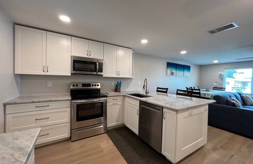Naples Park Cottage | Blue Water Retreat @ Vanderbilt- steps to beaches/shopping/dining/entertainment!