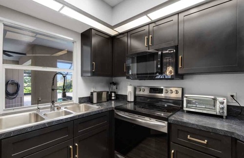 Pebble Beach House | Boca Grande Getaway 4BR 2BA Golf Couse HEATED POOL