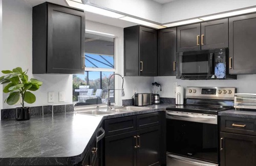 Pebble Beach House | Boca Grande Getaway 4BR 2BA Golf Couse HEATED POOL