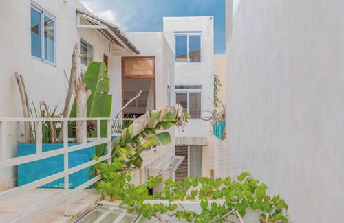 Zona Colonial Apartment | Bohechio studio with private balcony, pool views, ensuite bath, and kitchen.