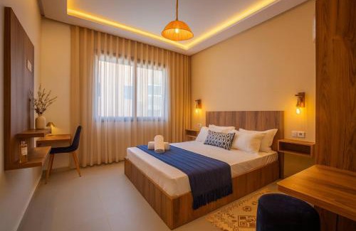 Imi Ouaddar Apartment | Boho Beige Apartment - Walkable to Beach with Workspace, Fast WiFi, AC & Full Kitchen