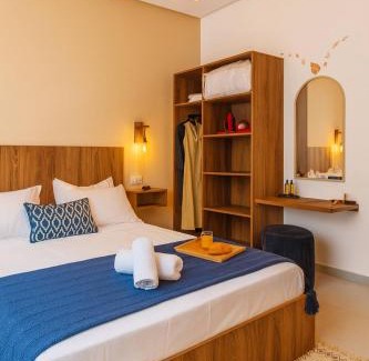 Imi Ouaddar Apartment | Boho Beige Apartment - Walkable to Beach with Workspace, Fast WiFi, AC & Full Kitchen
