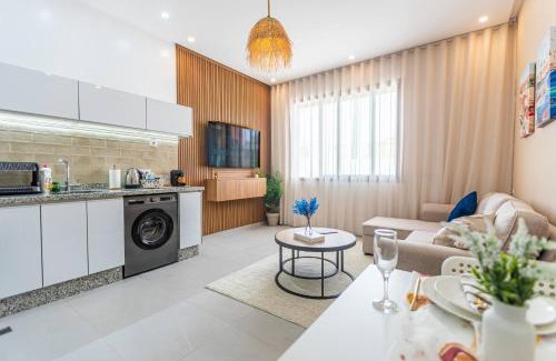 Imi Ouaddar Apartment | Boho Beige Apartment - Walkable to Beach with Workspace, Fast WiFi, AC & Full Kitchen