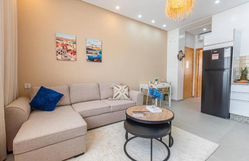 Imi Ouaddar Apartment | Boho Beige Apartment - Walkable to Beach with Workspace, Fast WiFi, AC & Full Kitchen