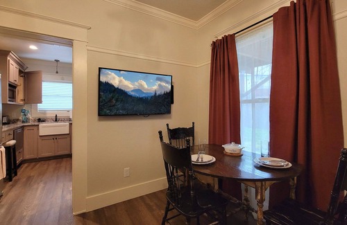Historic Railroad District House | BookStayHop -RedTail Orliena Suite, Relaxing Hot tub and a Tesla Station