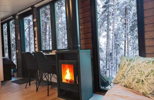 Muonio House | Borealis Village 10 with a Nature View, Fireplace, Sauna, Kitchen