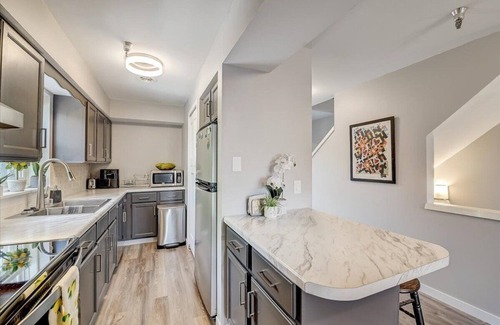 Regent Condo | Boutique Madison Condo off University Ave with Two Private Garage Spaces!