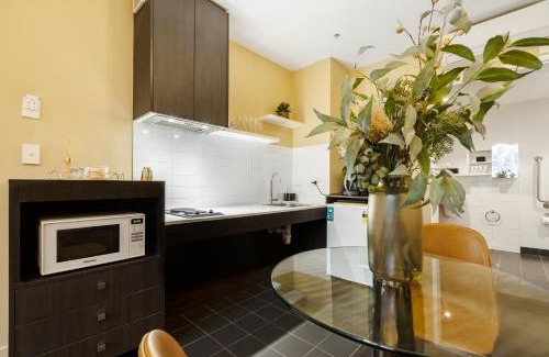 Melbourne Central Business District Apartment | Boutique Retreat in Heart of CBD Mobility-Friendly