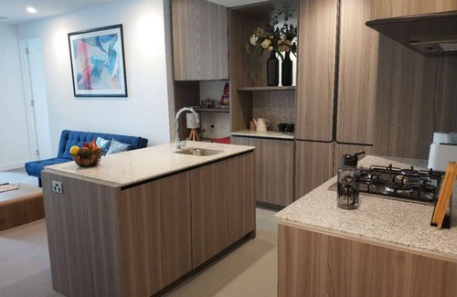 Melbourne Apartment | Brand New 2BD High speed WIFI+Parking at request/Walking Distance to Everything