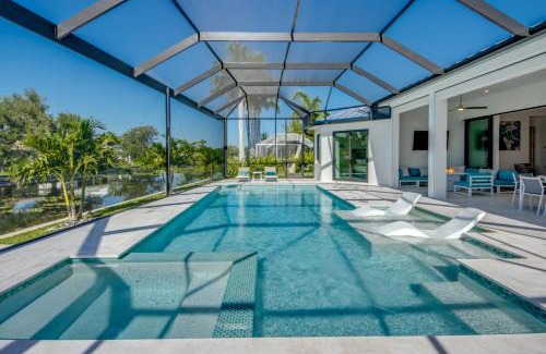 Fort Myers Villa | BRANDNEW Villa-PureSun at Canal intersection, heated saltwater pool and spa, facing south